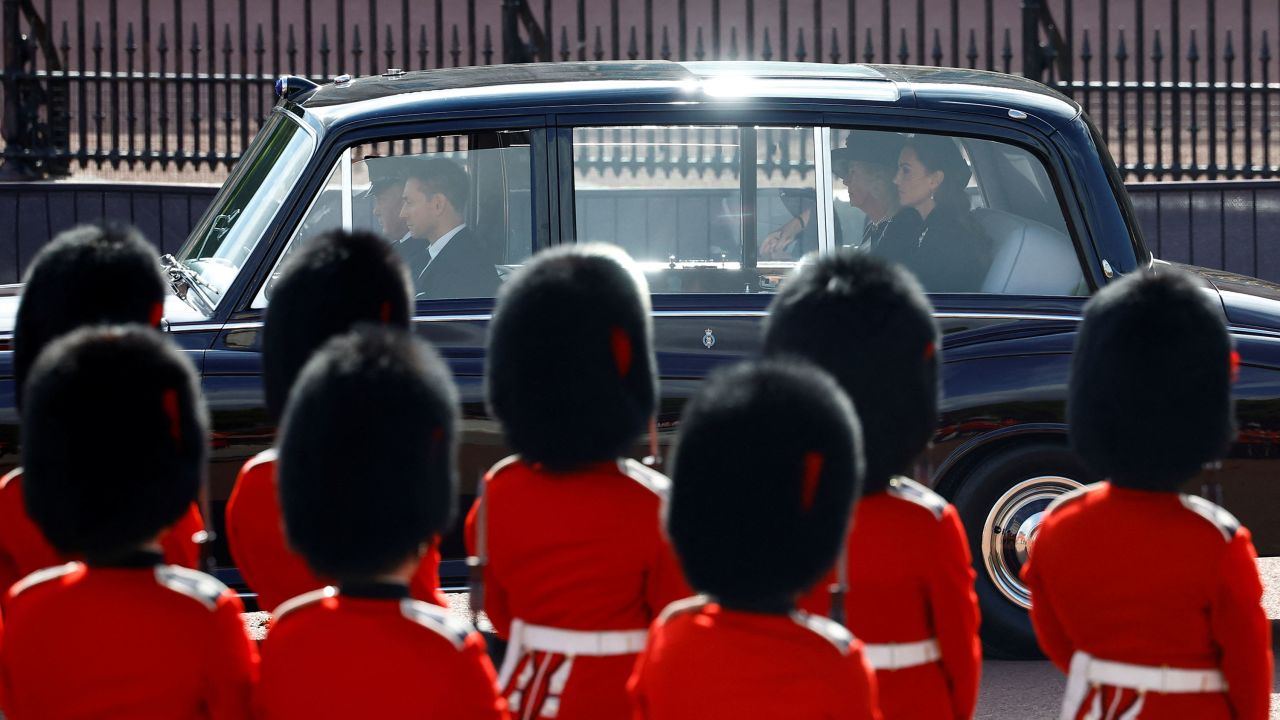 Camilla, Queen Consort and Catherine, Princess of Wales are seen during the procession.