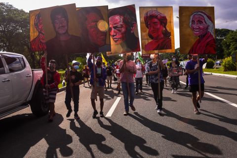 People participate in a rally during a global day of action on climate change in Manila, Philippines, on November 6. 