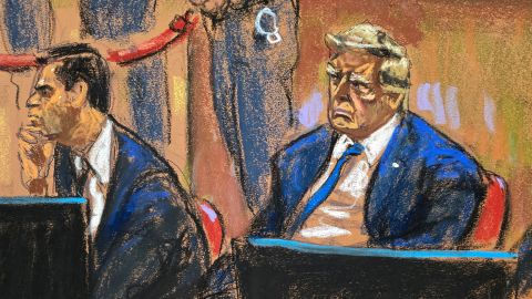 Former President Donald Trump sits beside his lawyer Todd Blanche during jury selection.