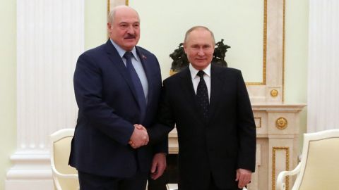 Belarus President Alexander Lukashenko is greeted by Russian President Vladimir Putin at the Kremlin in Moscow on March 11.