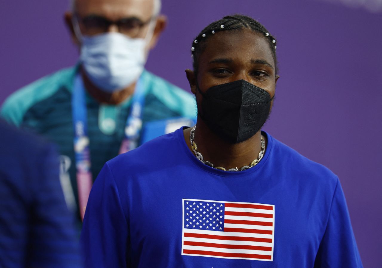 Bronze medallist Noah Lyles of the United States is pictured in a protective face mask after receiving medical attention.