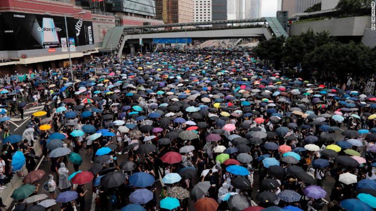 Protestors with umbrellas gather near the Legislative Council in Hong Kong.