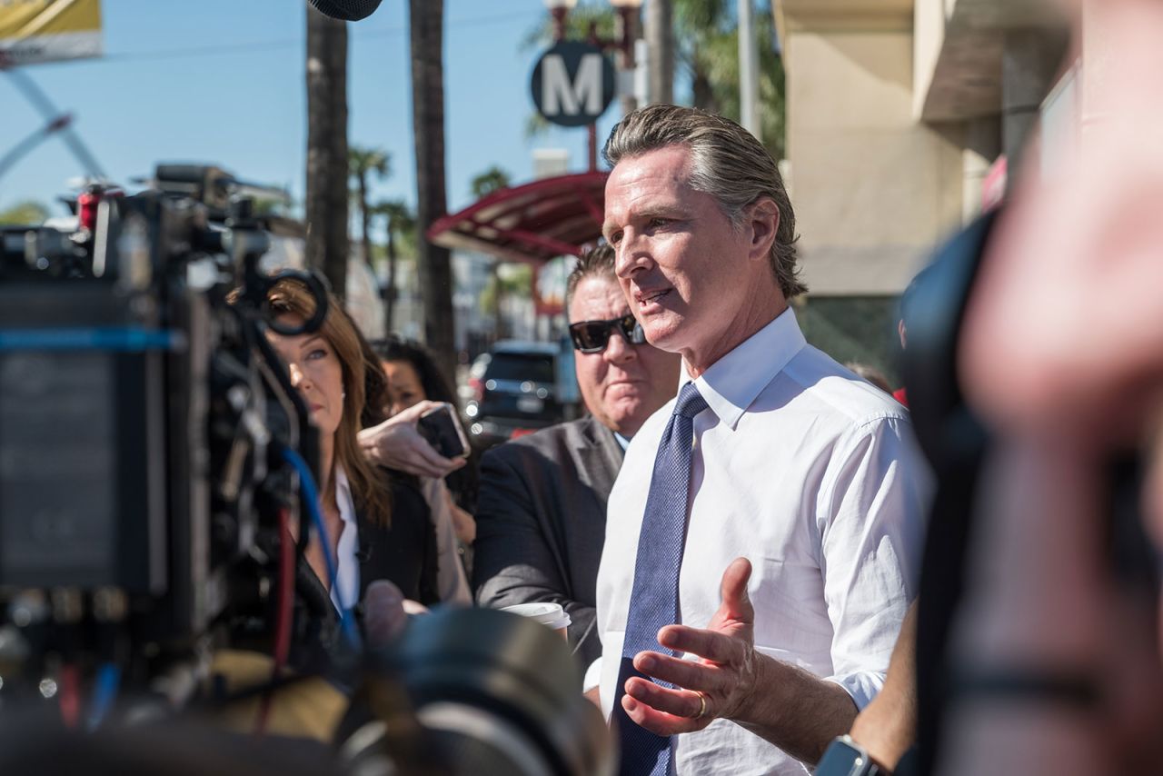 California Gov. Gavin Newsom speaks with members of the media during his visit to Monterey Park on Monday.