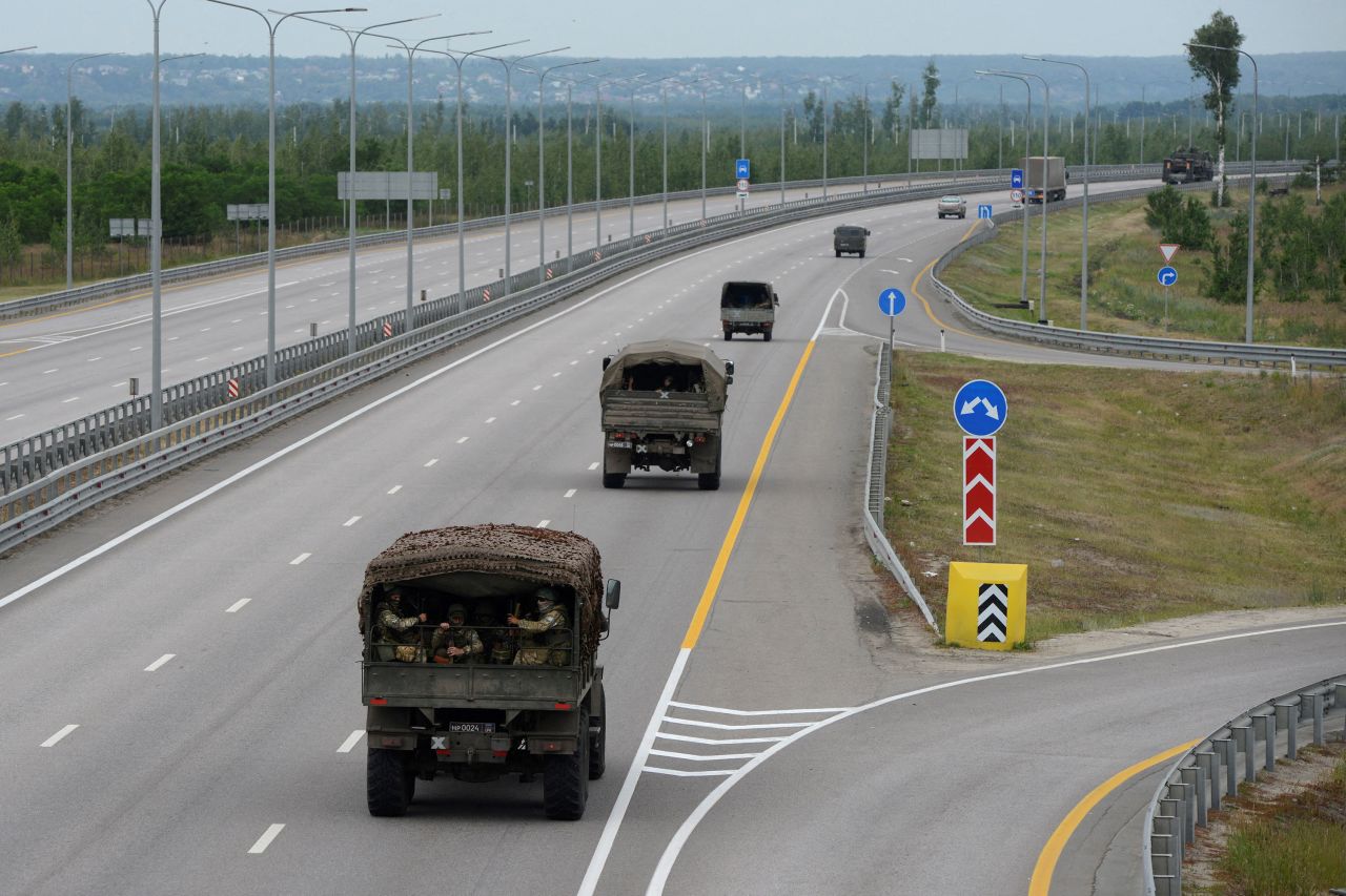 A military column of the Wagner private mercenary group drives along M-4 highway, which links the capital Moscow with Russia's southern cities, near Voronezh, Russia, on Saturday.