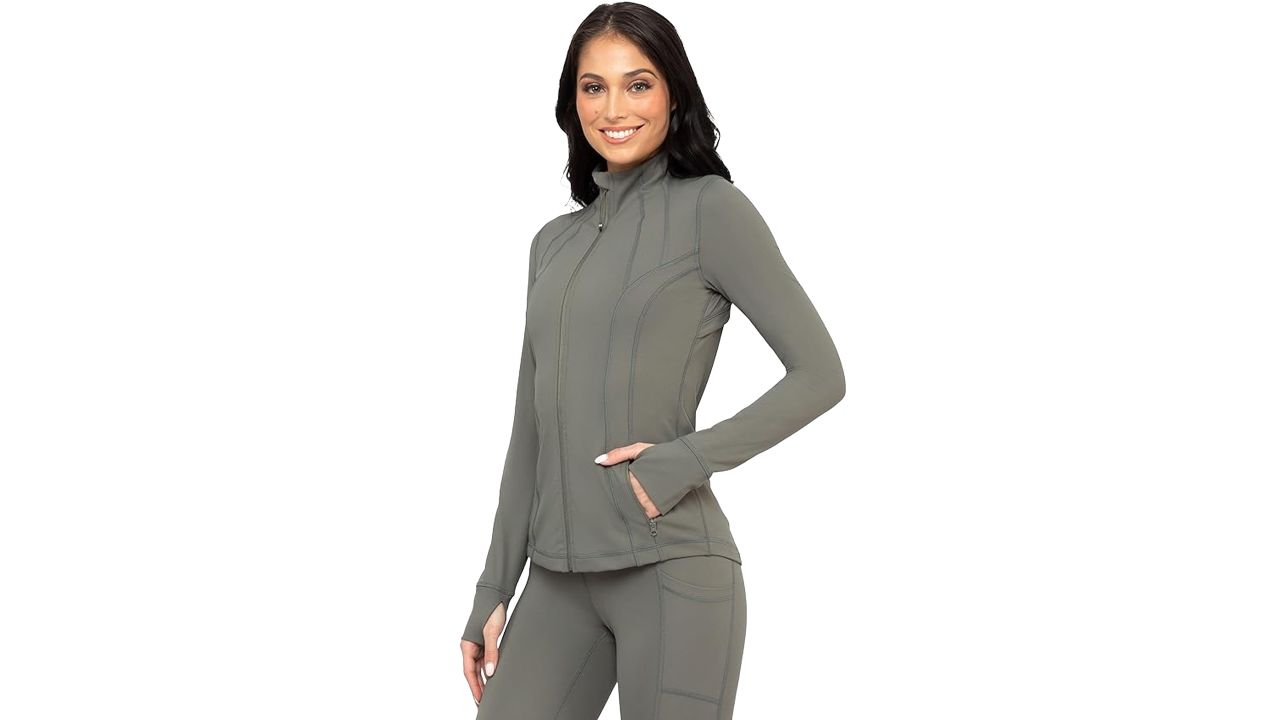 Woman wearing 90 degree by reflex Women’s Lightweight Full-Zip Running Track Jacket in mulled basil