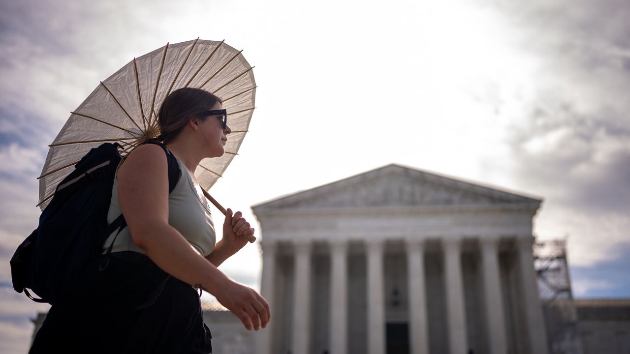 A person walks past the Supreme Court building in Washington, DC, on June 20. 