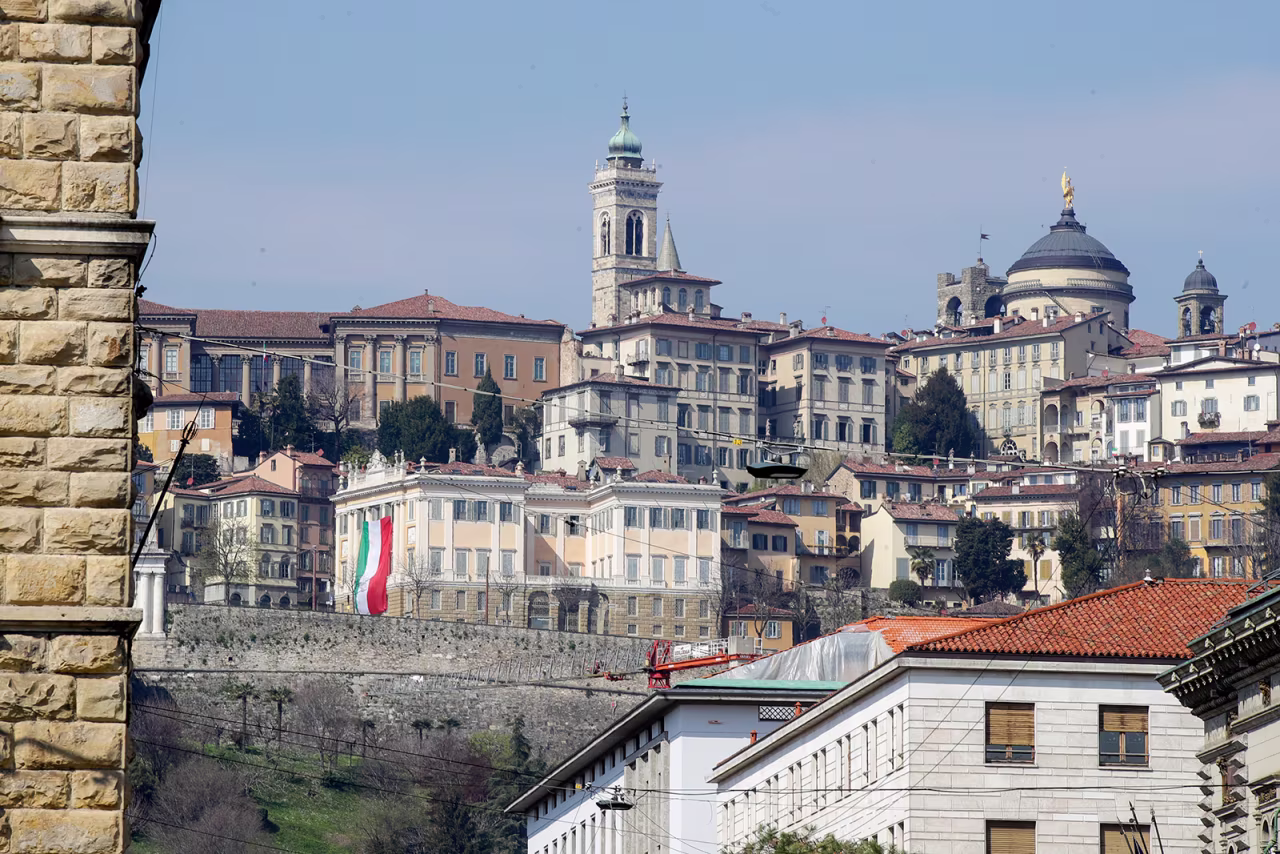 A large flag of Italy hangs from the facade of Palazzo Medolago Albani in Bergamo Alta, the heart of the hardest-hit province in Italy, in the Lombardy region, on March 17.