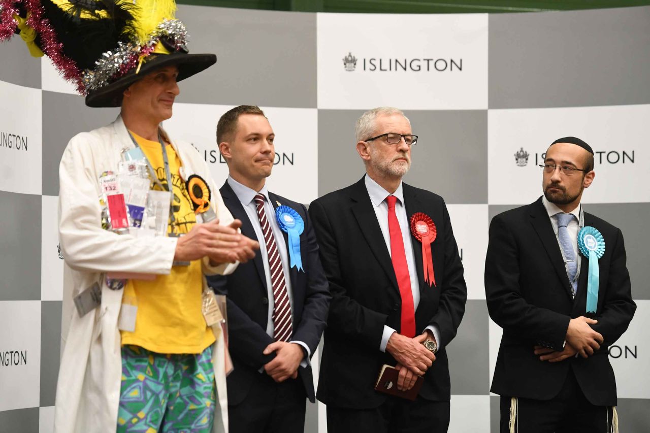 Labour leader Jeremy Corbyn appears beside other candidates at Sobell Leisure Centre for the Islington North constituency ahead of the vote count results. Photo: Joe Giddens/PA Images via Getty Images