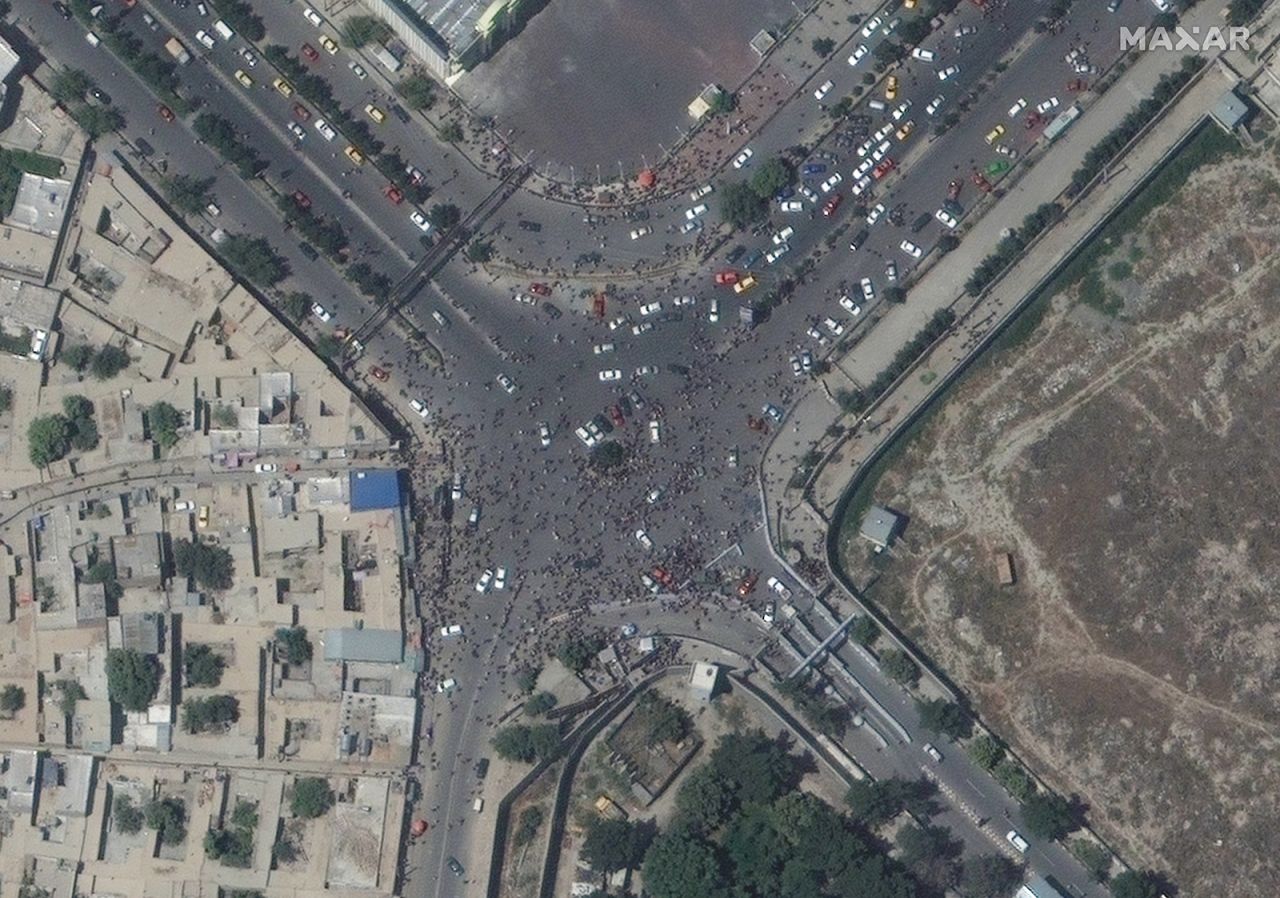 Crowds are seen near the entrance to Kabul International Airport.