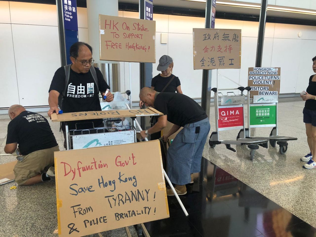 Protesters set up shop outside the arrivals terminal in Hong Kong International Airport.