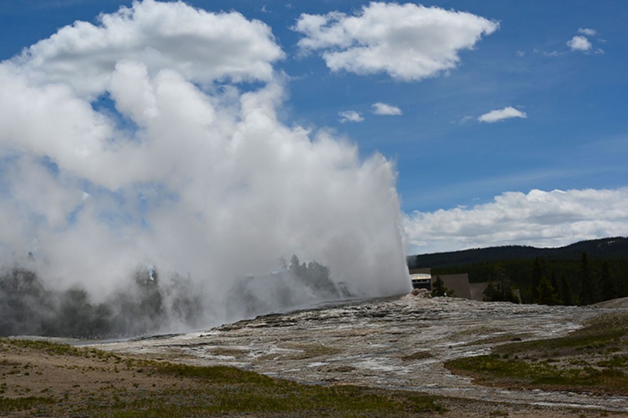 Old Faithful geyser erupts in Yellowstone National Park in Wyoming on June 11, 2019