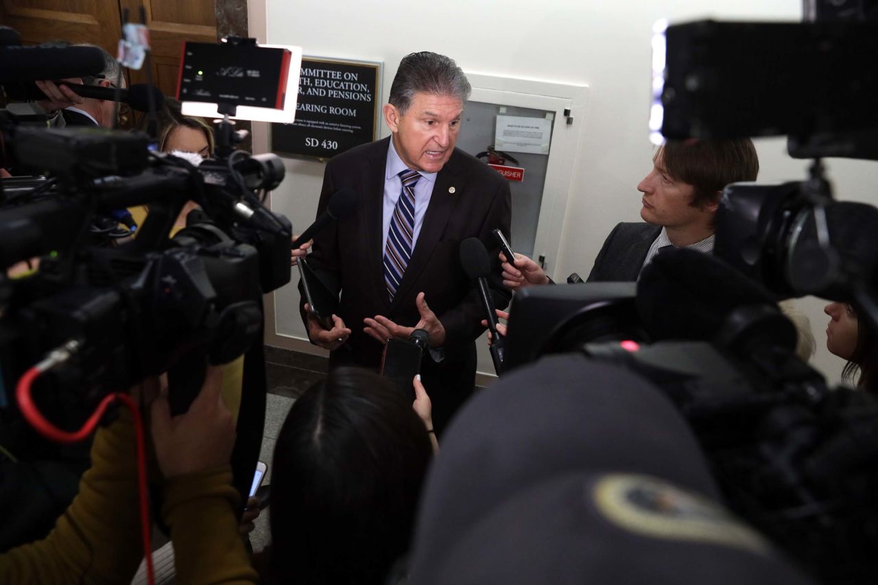 Sen. Joe Manchin speaks to the media after a briefing on the coronavirus outbreak on Capitol Hill in Washington, D.C., on March 12.