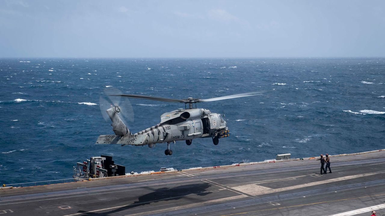 An MH-60R Seahawk takes off from the flight deck of the aircraft carrier USS Nimitz during flight operations in the US Central Command area of responsibility.