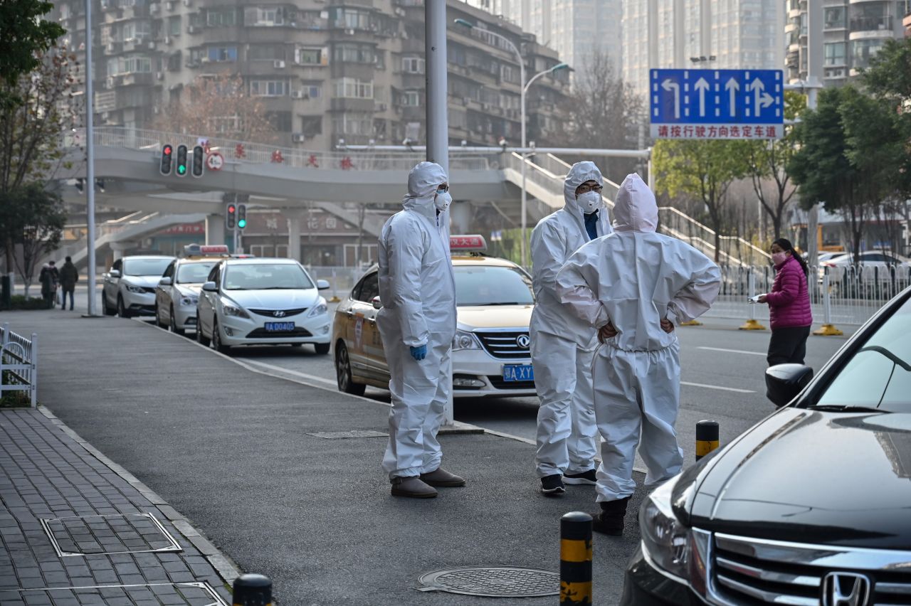 Officials in protective suits in Wuhan, China, on January 30.
