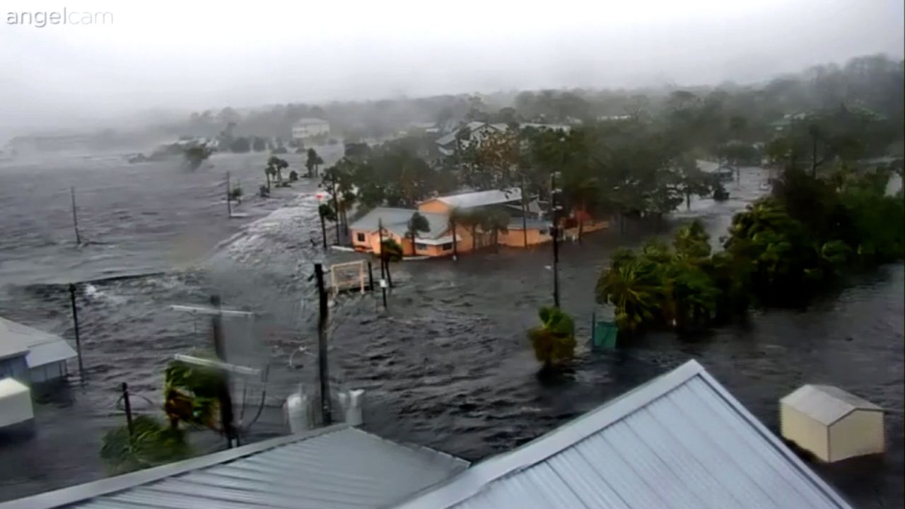 A small structure, bottom left, is seen floating away from the Steinhatchee Marina in Steinhatchee, Florida, on Wednesday.