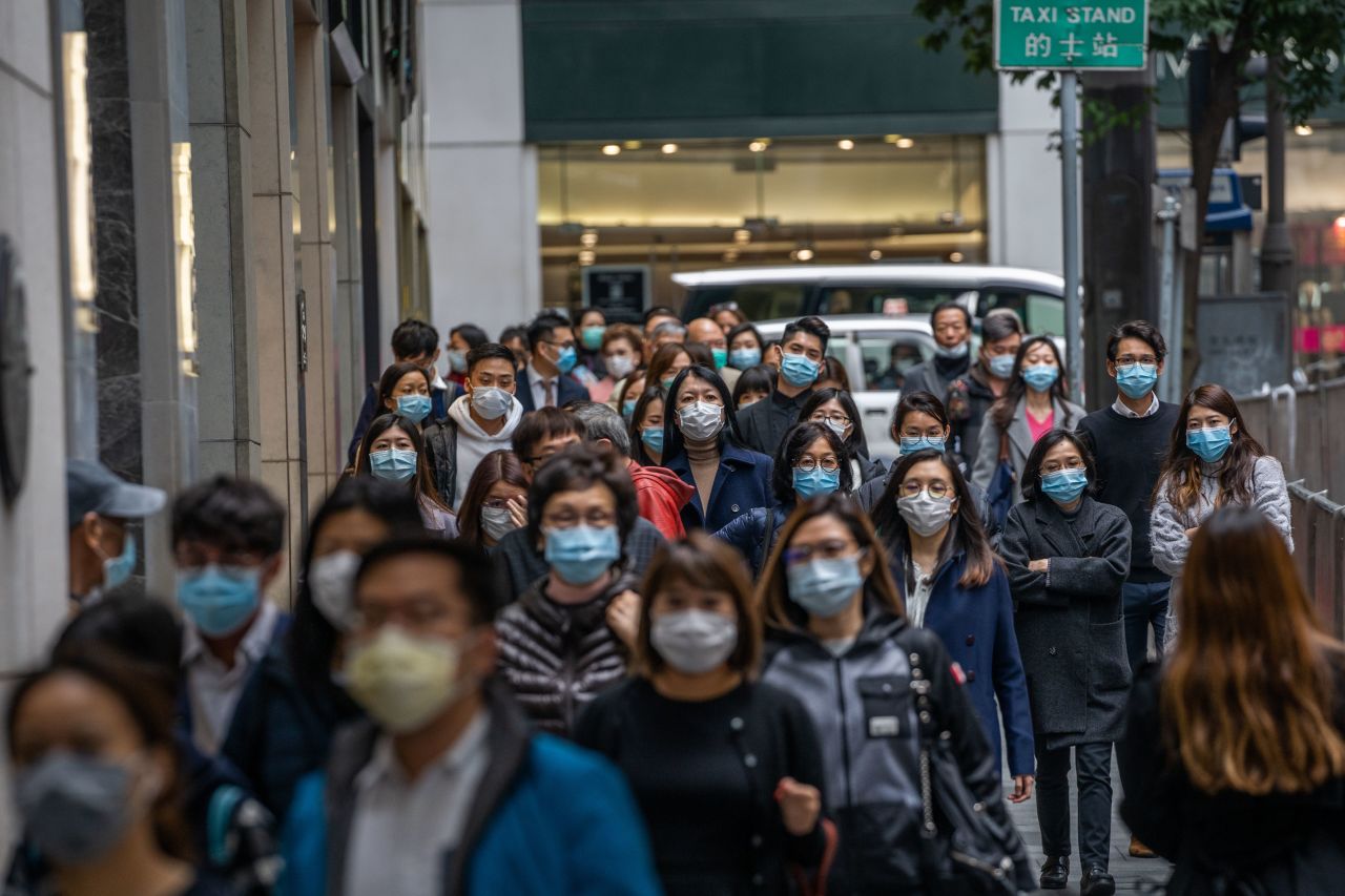 People wearing surgical masks in central district of Hong Kong as a preventative measure following the Coronavirus outbreak which began in the Chinese city of Wuhan. 