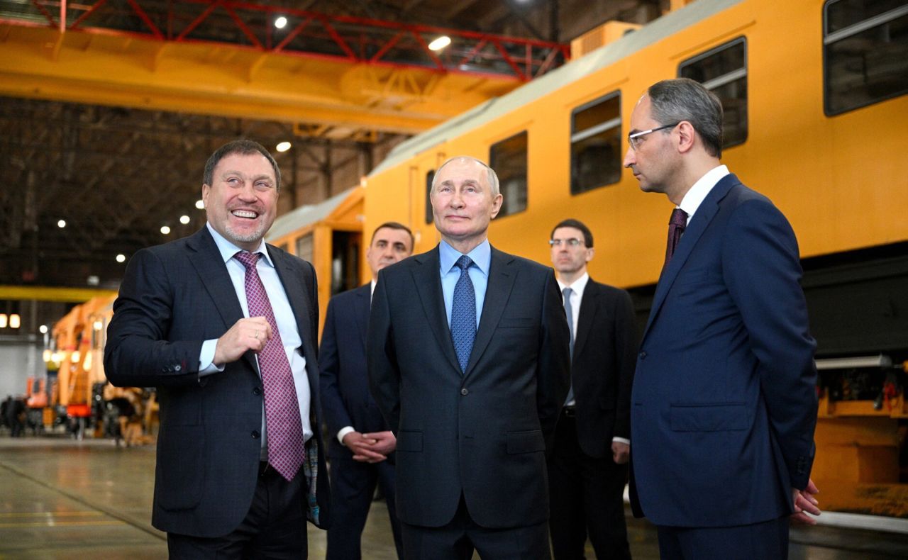 Russian President Vladimir Putin, center, inspects a facility of Tulazheldormash (Tula Railway Engineering Plant),  in Tula, Russia, on April 4.