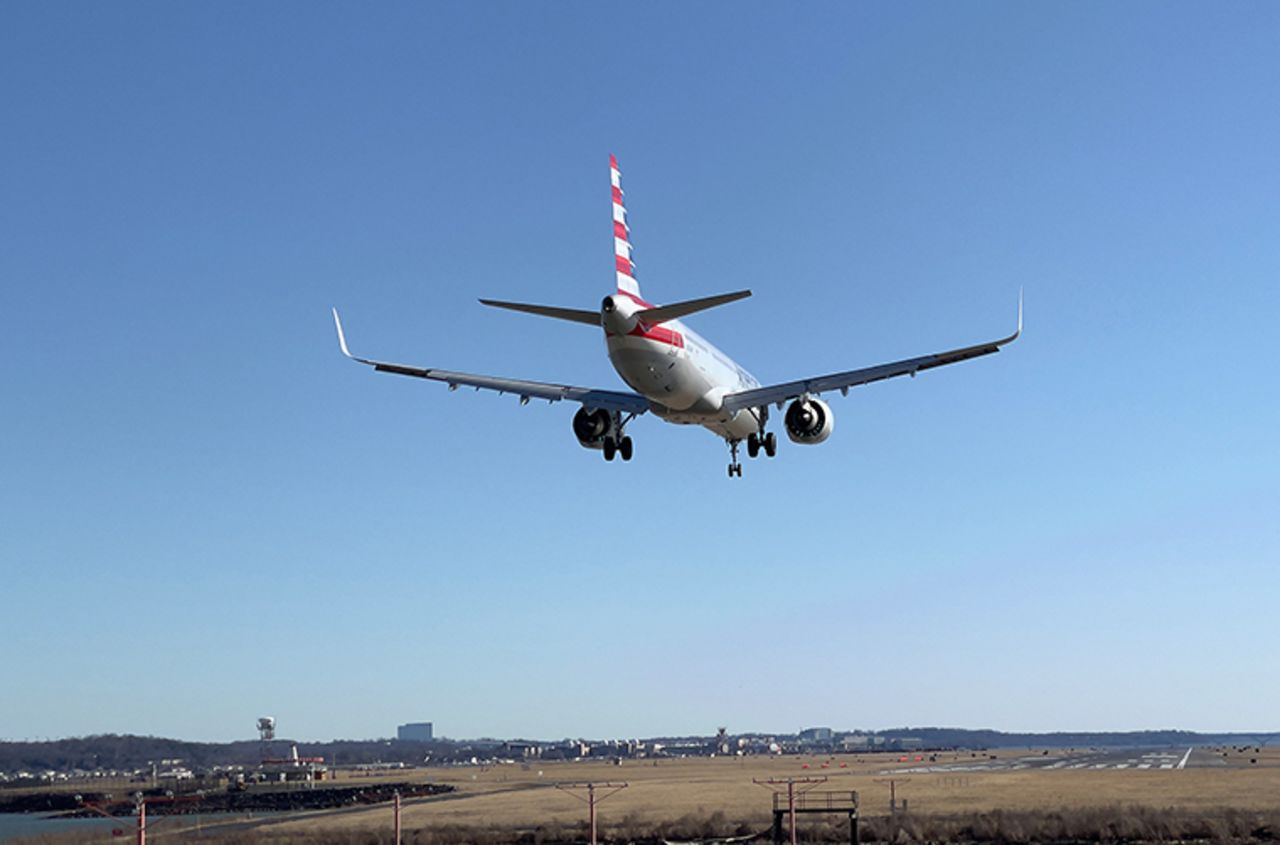 An American airlines Airbus A321-200 approaches Washington Ronald Reagan National Airport (DCA) in Arlington, Virginia on February 24, 2021. 