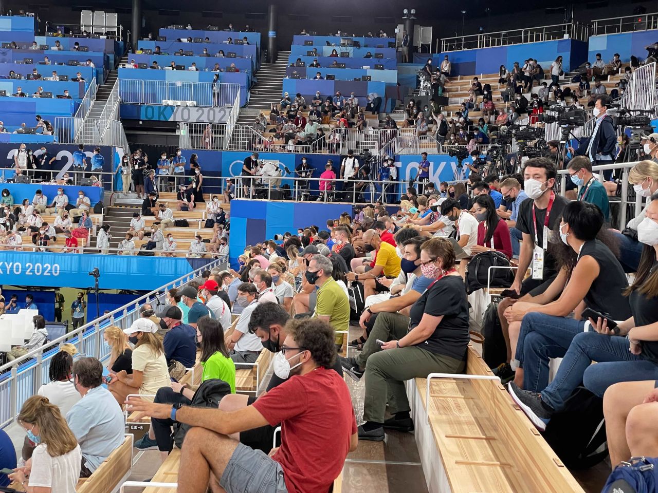 Members of the media are seen in the stands ahead of the women's balance beam final event.