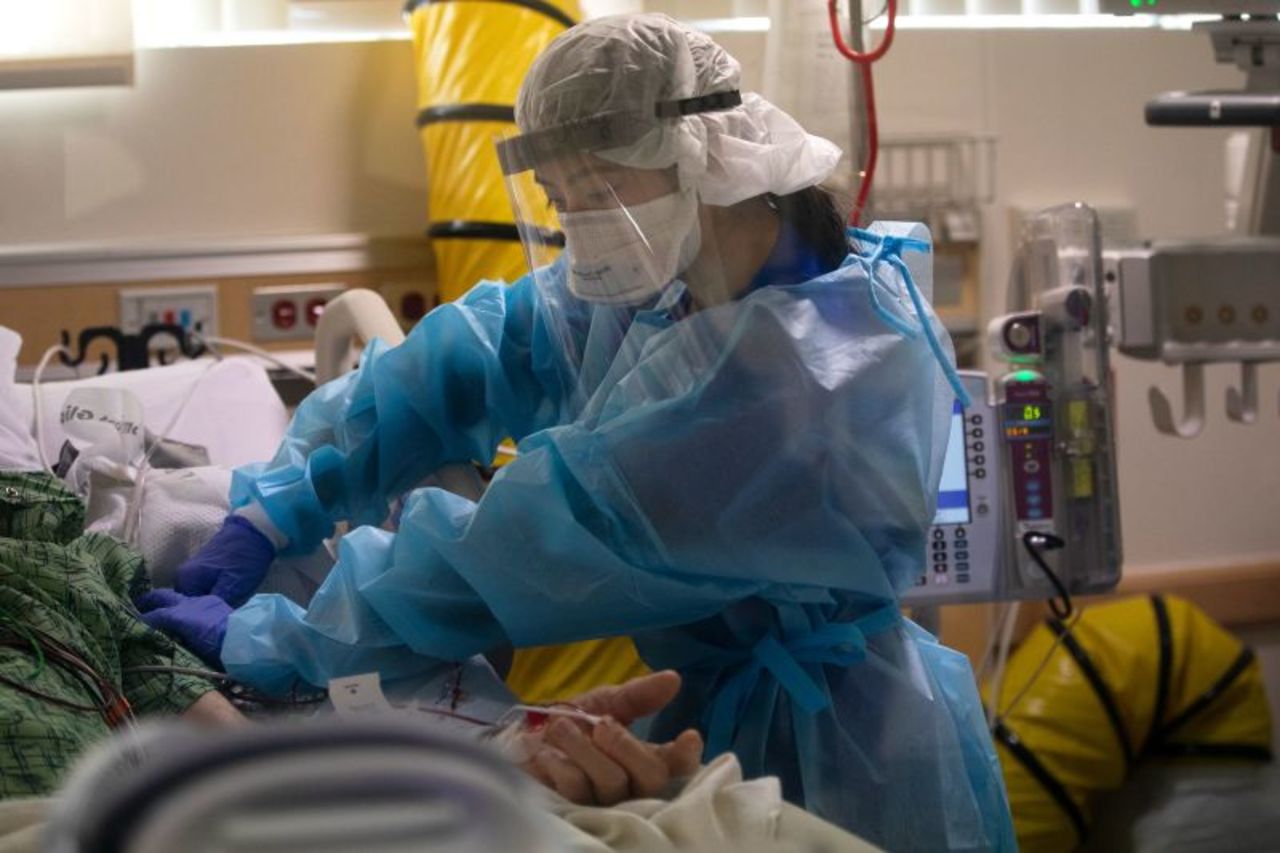 A nurse tends to a Covid-19 patient inside the intensive care unit of Providence St. Jude Medical Center on December 25 in Fullerton, California.?