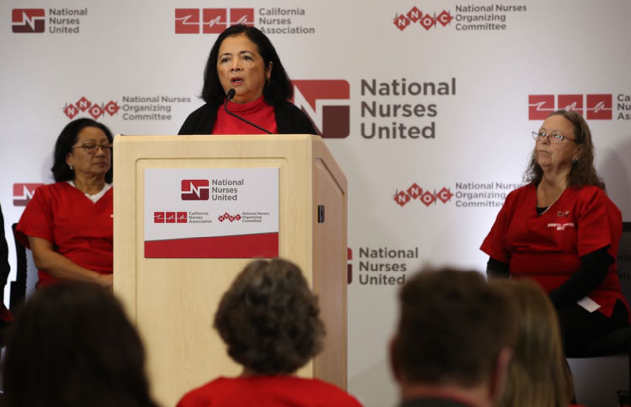 Bonnie Castillo, executive director of National Nurses United, speaks during a news conference at the National Nurses United offices on March 5 in Oakland, California. 