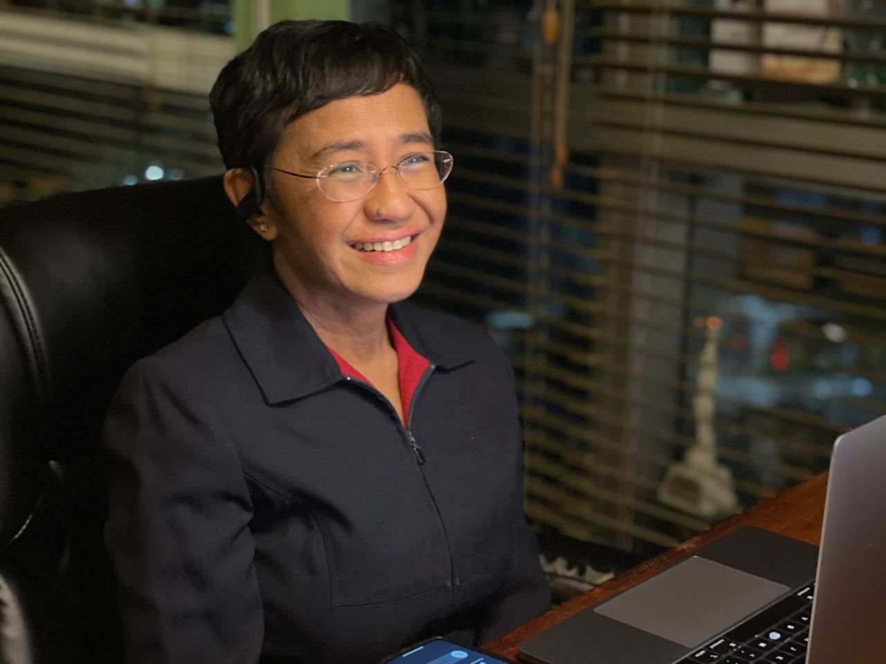 In this photo provided by Rappler, CEO and Executive Editor Maria Ressa reacts after hearing of her winning the Nobel Peace Prize inside her home in Metro Manila, Philippines on October 8, 2021.