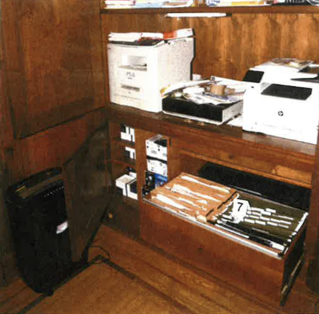 This photo from page 93 of the US Department of Justice Special Counsel's special report shows notebooks in a file cabinet in President Joe Biden's Delaware home office.