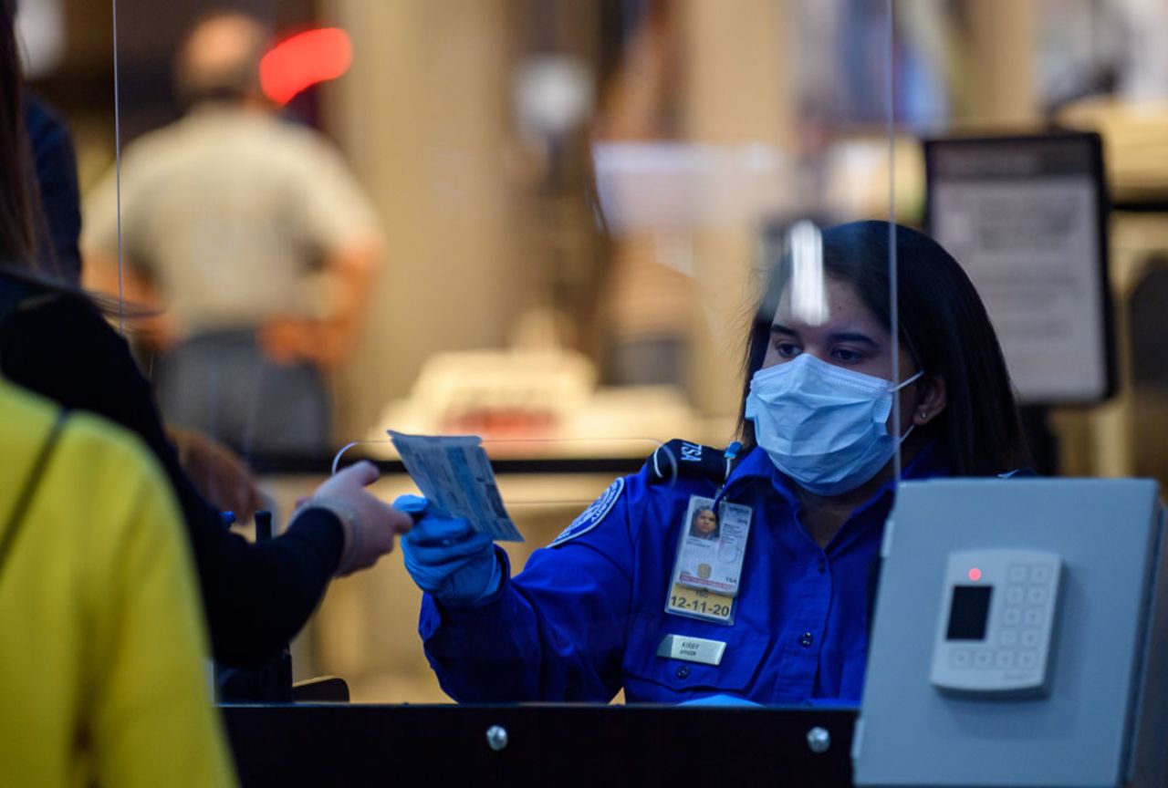 Travelers make their way through ticketing and TSA inspection as State of Pennsylvania remains under restrictions for work and travel at Pittsburgh International Airport on May 7, in Pittsburgh, Pennsylvania.