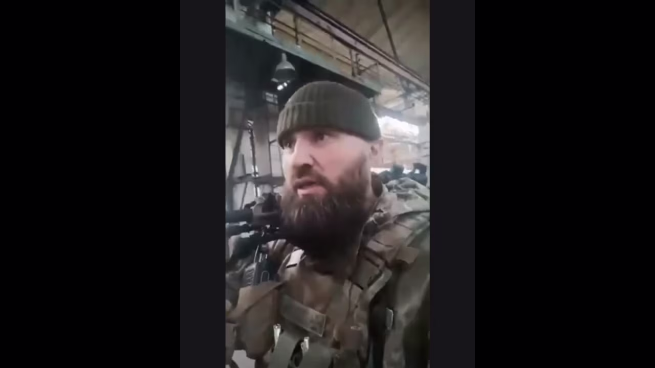A still from a video released by the Ukrainian Border Guard showing Ukrainian snipers setting up an ambush for Wagner fighters at industrial plant in Bakhmut on Saturday.