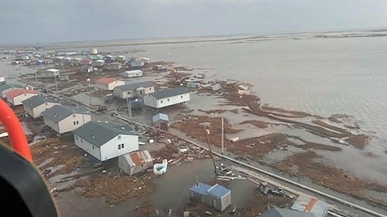 U.S. Coast Guard MH-60 Jayhawk helicopter aircrews conduct overflights of Kipnuk, Alaska, after coastal flooding impacted several western Alaska communities, Oct. 12, 2025. The Coast Guard continues to support the state of Alaska’s response efforts in impacted communities. (U.S. Coast Guard photo courtesy of Air Station Kodiak)