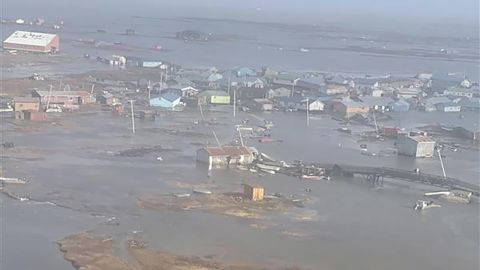 U.S. Coast Guard MH-60 Jayhawk helicopter aircrews conduct overflights of Kipnuk, Alaska, after coastal flooding impacted several western Alaska communities, Oct. 12, 2025. The Coast Guard continues to support the state of Alaska’s response efforts in impacted communities. (U.S. Coast Guard photo courtesy of Air Station Kodiak)