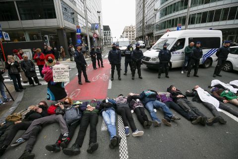 Members of the climate action group Extinction Rebellion lay in the street during a protest in Brussels, Belgium, November 6. 