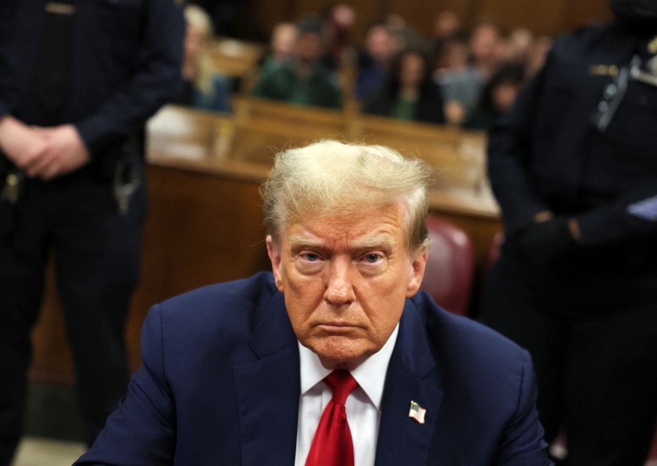 Former President Donald Trump sits in a courtroom in Manhattan Criminal Court on Tuesday, April 23.