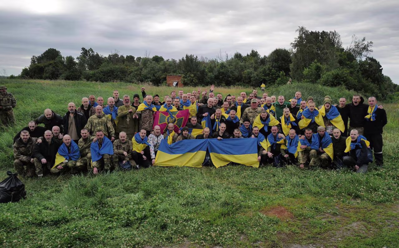 Ukrainian prisoners of war are seen after a swap in Ukraine in this photo, released June 11. 