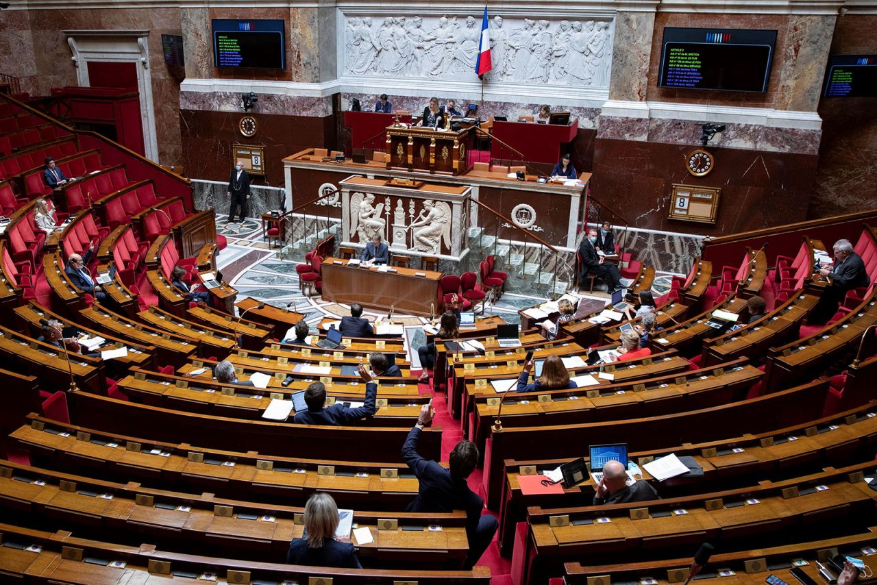 French MPs vote on an amendment during a debate on the extension of the nationwide state of emergency at the National Assembly in Paris on May 8.