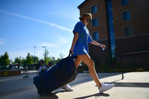In this file photo, an incoming freshman moves into a campus dorm at University of Colorado Boulder on August 18, 2020 in Boulder, Colorado.