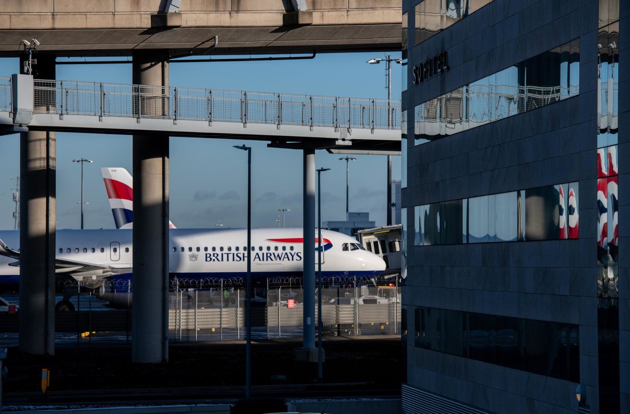 British Airways airplanes are seen behind a Sofitel hotel at Heathrow Airport on January 25, in London, England. 