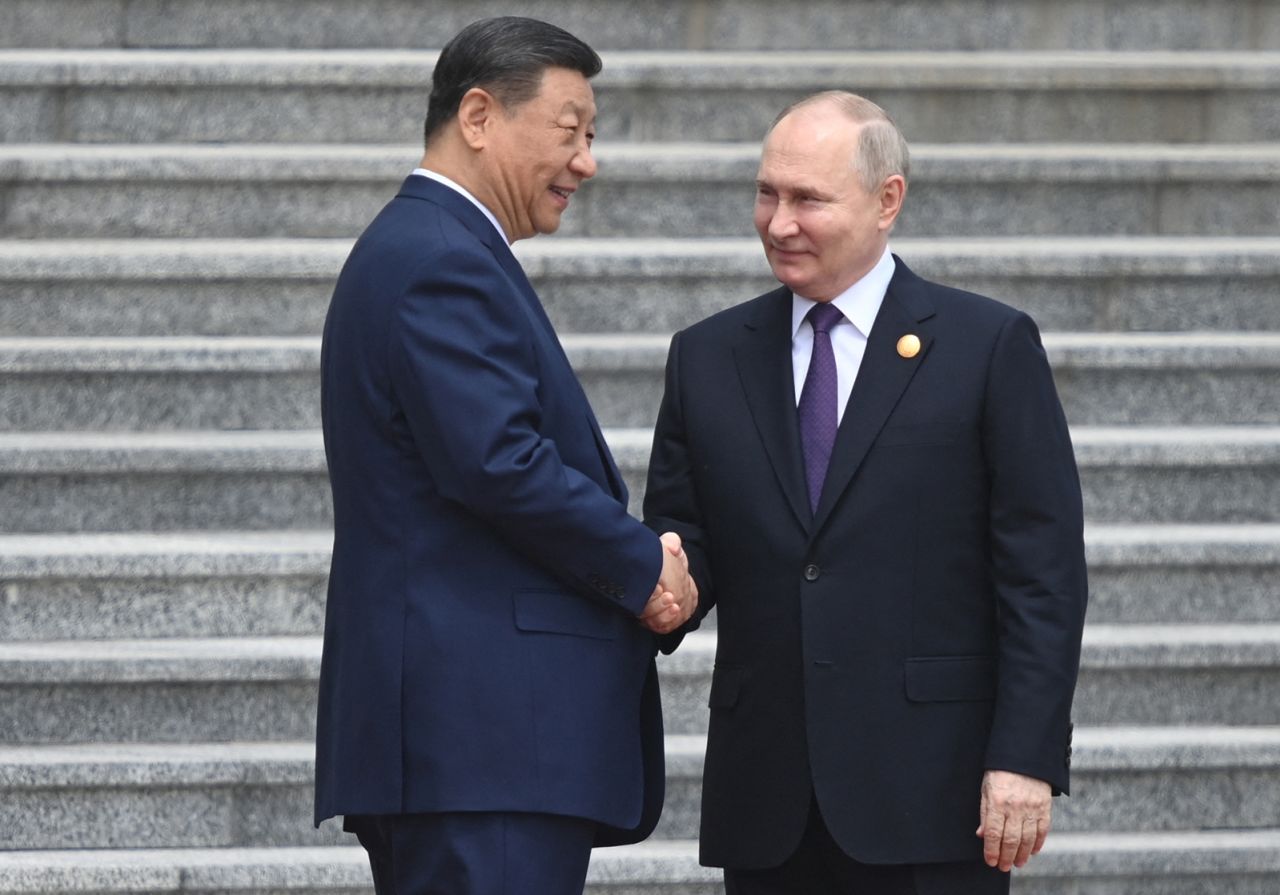 Russia's President Vladimir Putin and China's President Xi Jinping attend an official welcoming ceremony in front of the Great Hall of the People in Tiananmen Square in Beijing on May 16.