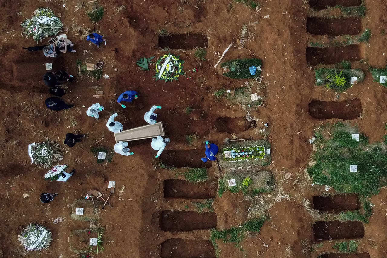 This aerial photo shows an alleged coronavirus victim being buried at the Vila Formosa Cemetery on the outskirts of Sao Paulo, Brazil, on May 22.