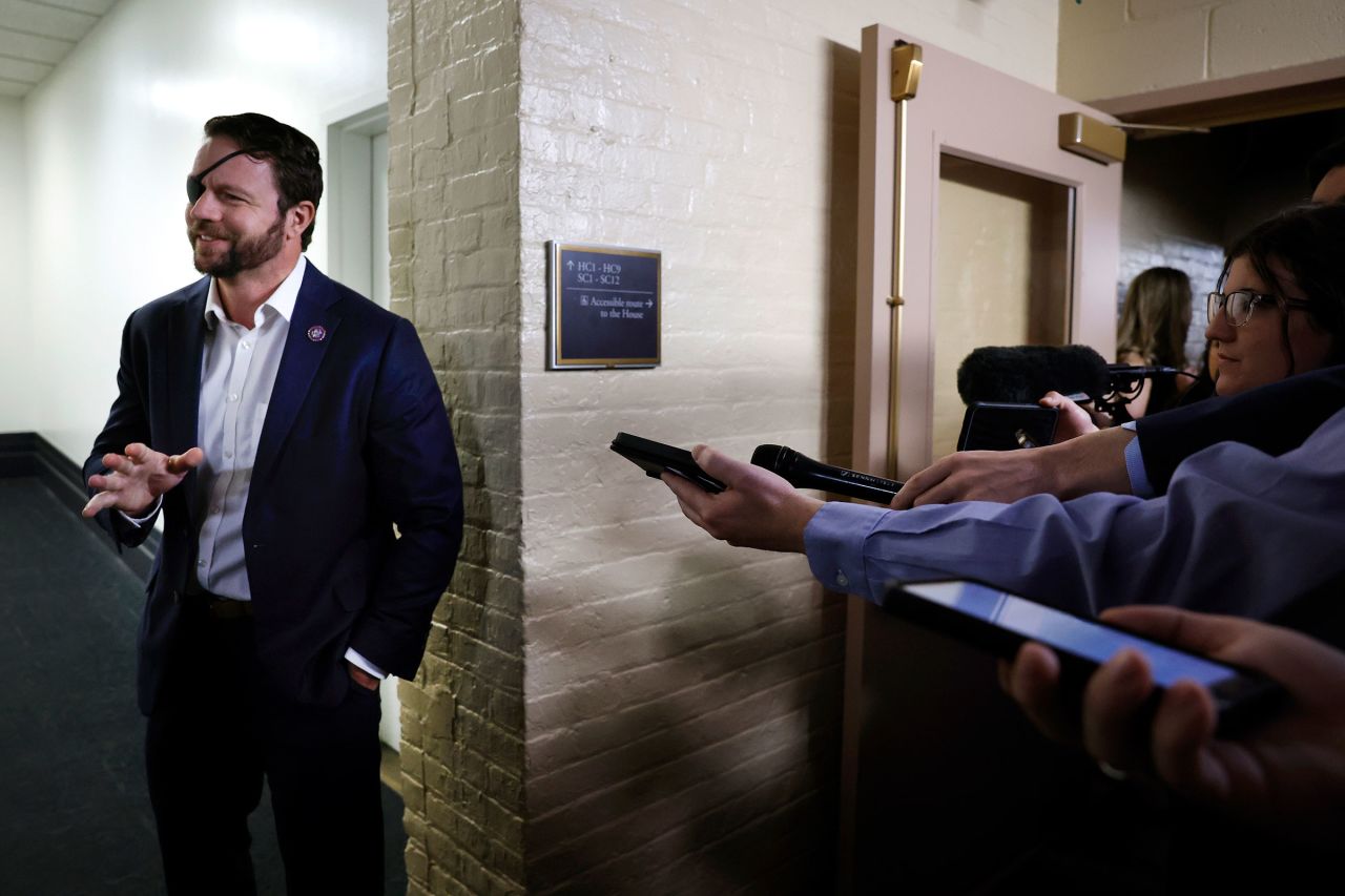 Rep. Dan Crenshaw leaves a House Republican caucus meeting at the US Capitol on October 12, in Washington, DC