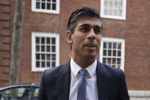 Britain's former Chancellor of the Exchequer Rishi Sunak arrives at his office in Millbank, in London Monday. 