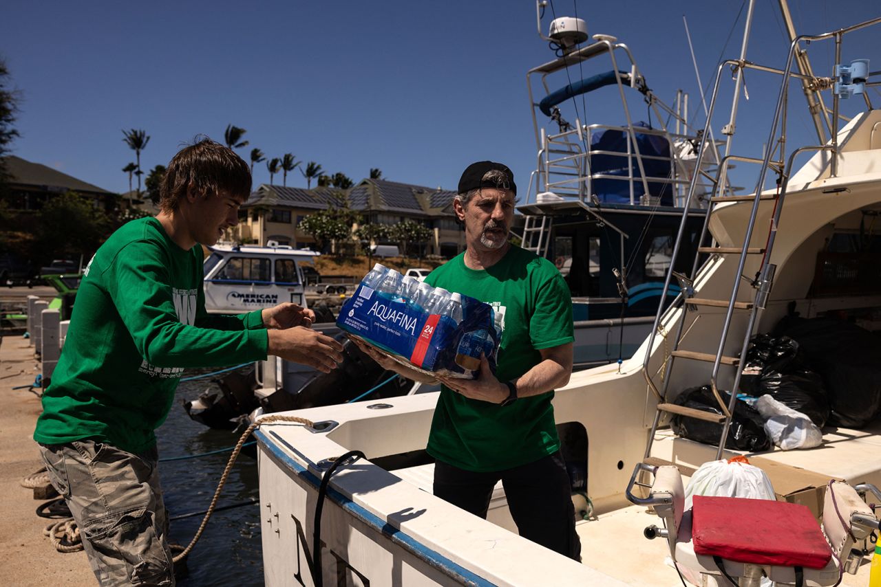 Mercy Worldwide volunteers load a boat with supplies to deliver to West Maui towns affected by wildfires on August 12.?