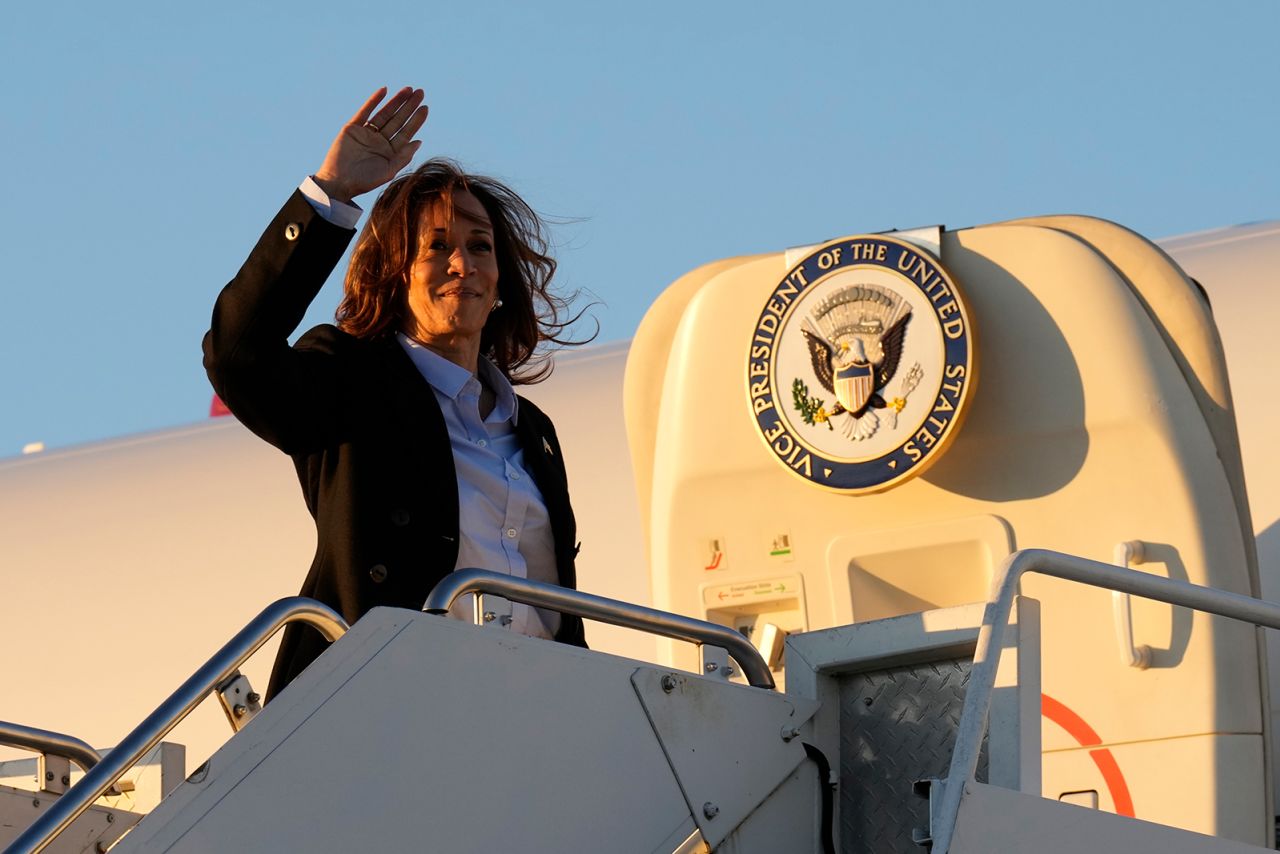 Kamala Harris waves as she boards Air Force Two at Pittsburgh International Airport in Pittsburgh, on Monday, September 2.