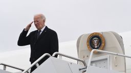 President Joe Biden salutes as he boards Air Force One after attending the dignified transfer of the remains of three US service members killed in the drone attack on the US military outpost in Jordan, at Dover Air Force Base in Dover, Delaware, on February 2. 