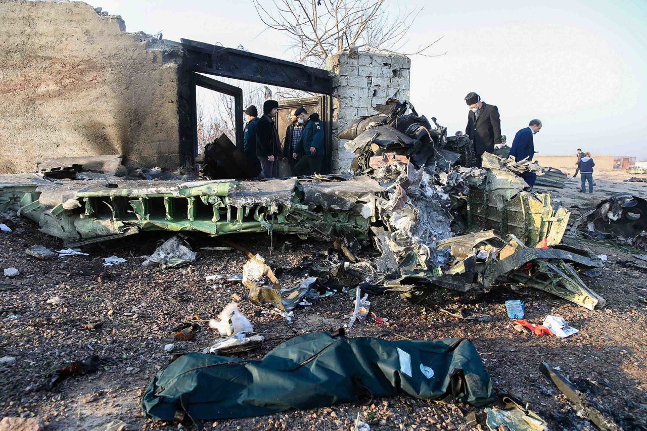 Authorities work near the wreckage of the Ukrainian plane on Wednesday.