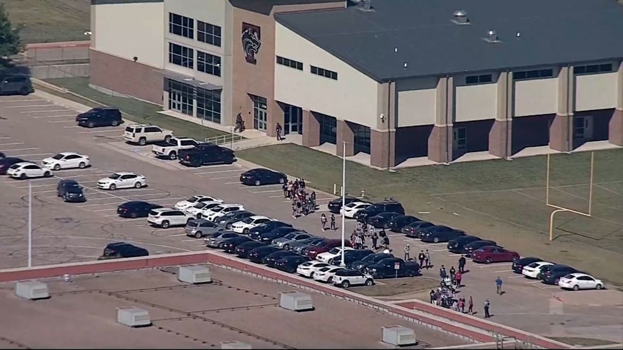 Students are seen walking out of Timberview High School in Arlington, Texas.