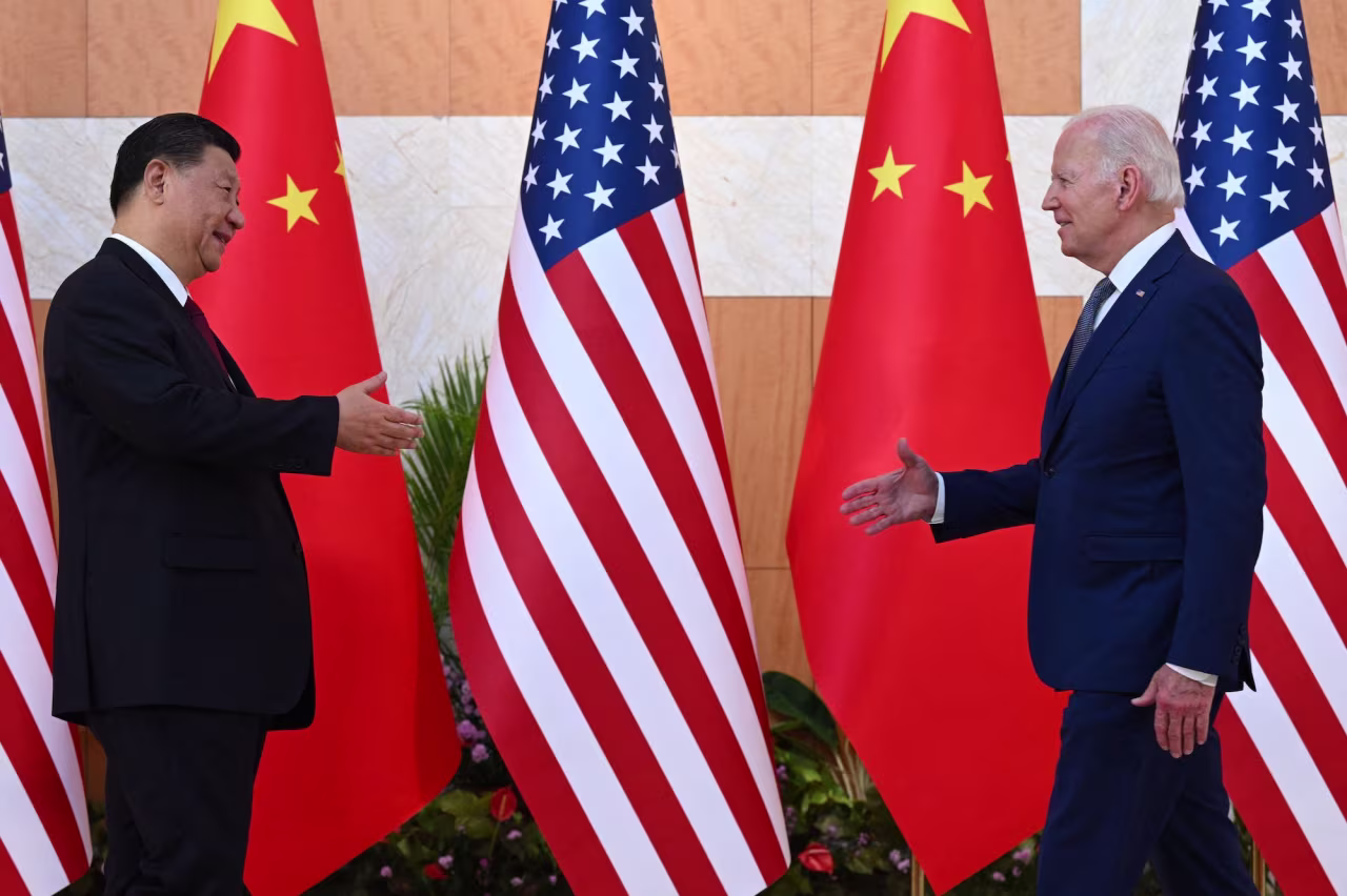 Joe Biden and Xi Jinping shake hands at the G20 Summit in Bali on November 14, 2022.