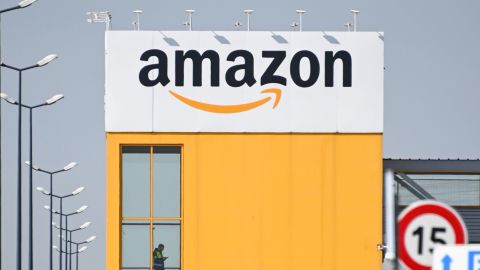 An Amazon employee is seen at the Amazon logistics center in Lauwin-Planque, France, on April 16.