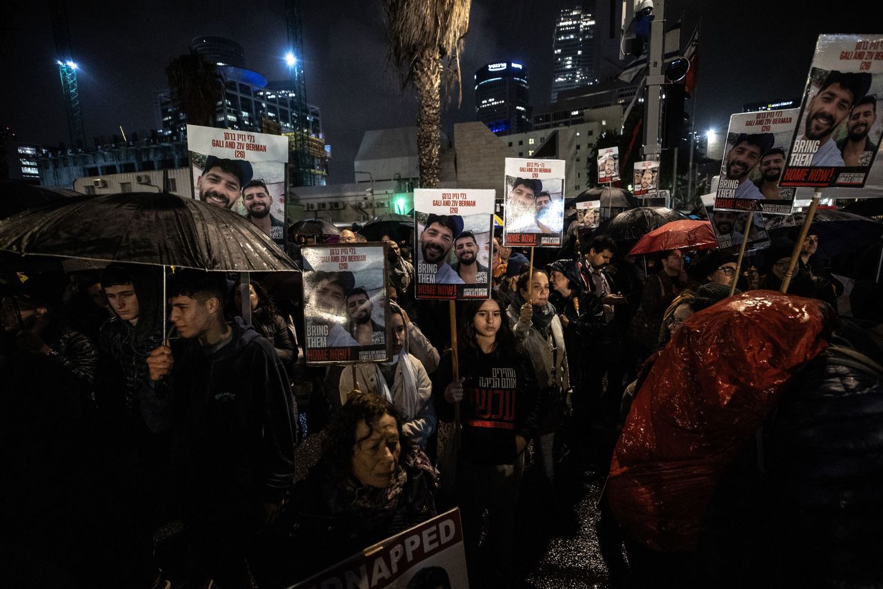 People call for the immediate release of all hostages at a rally in Tel Aviv, Israel, on December 23.