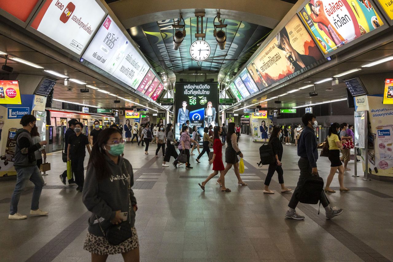 Commuters walk through Siam BTS Station in Bangkok, Thailand, on Monday, January 4.